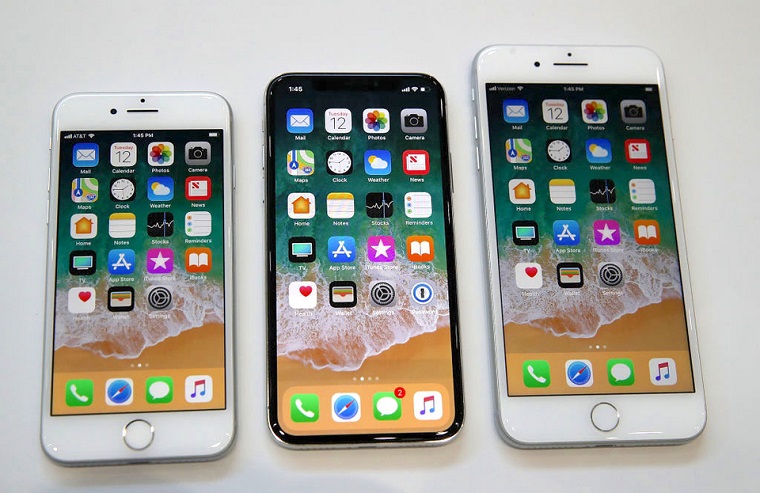 CUPERTINO, CA - SEPTEMBER 12: (L-R) The new iPhone 8, iPhone X and iPhone 8S are displayed during an Apple special event at the Steve Jobs Theatre on the Apple Park campus on September 12, 2017 in Cupertino, California. Apple held their first special event at the new Apple Park campus where they announced the new iPhone 8, iPhone X and the Apple Watch Series 3. (Photo by Justin Sullivan/Getty Images)